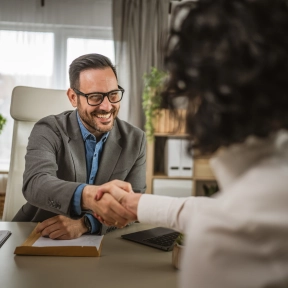 Mature woman sit at office and have job interview with manager or boss